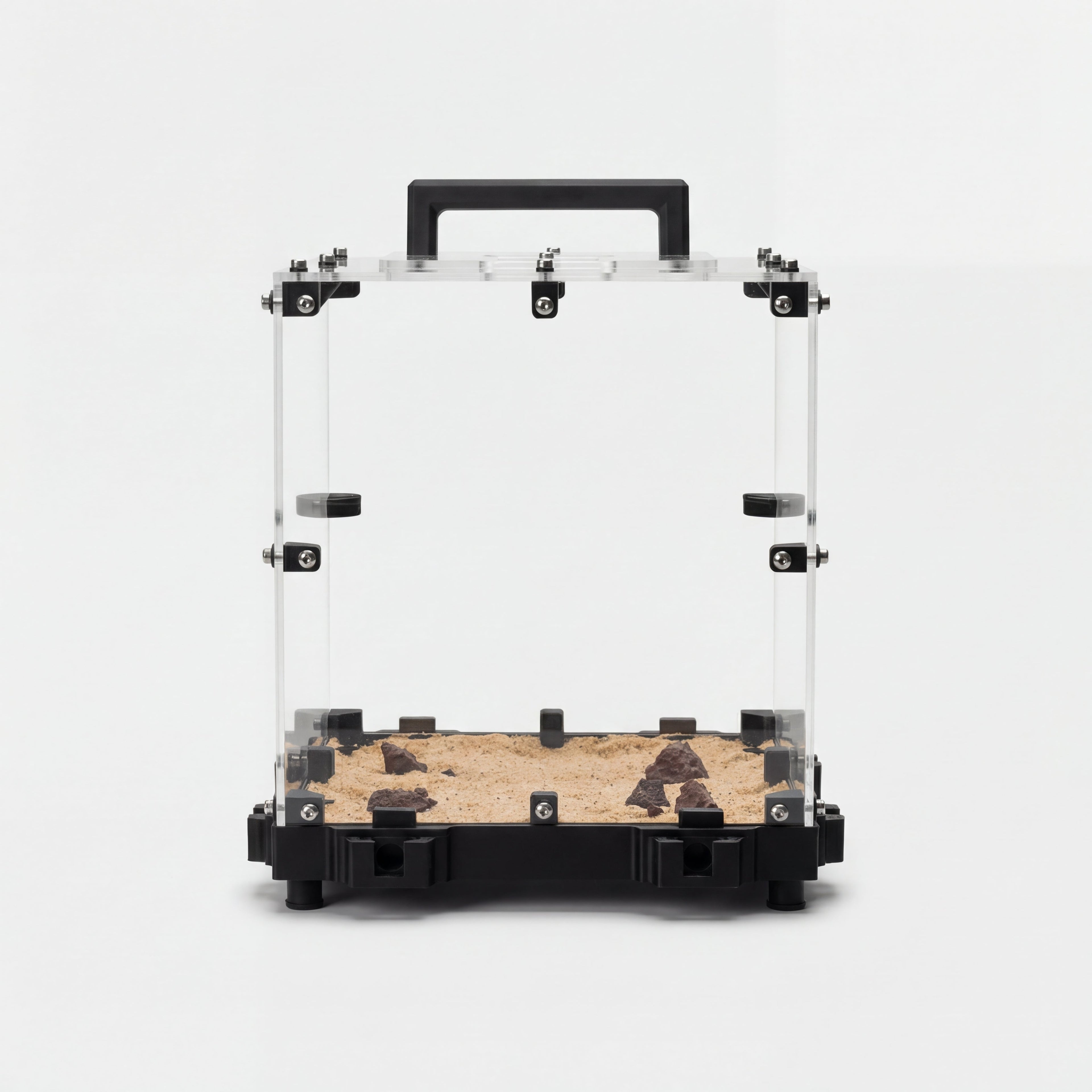 Transparent habitat box for terrarium with sand and rocks, showcasing a decorative display for plants or small animals.